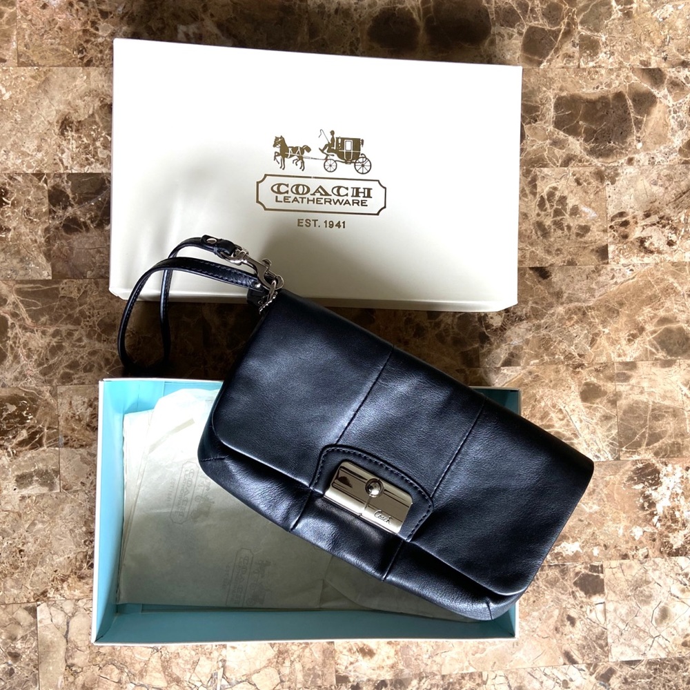 NWOT Coach Black Leather envelope tote. NEW with box.